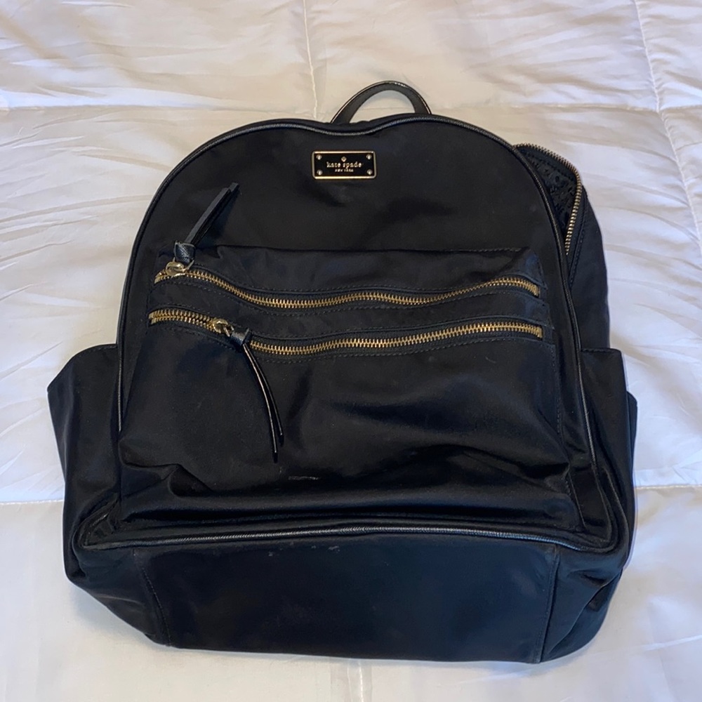Kate spade black backpack with gold zippers